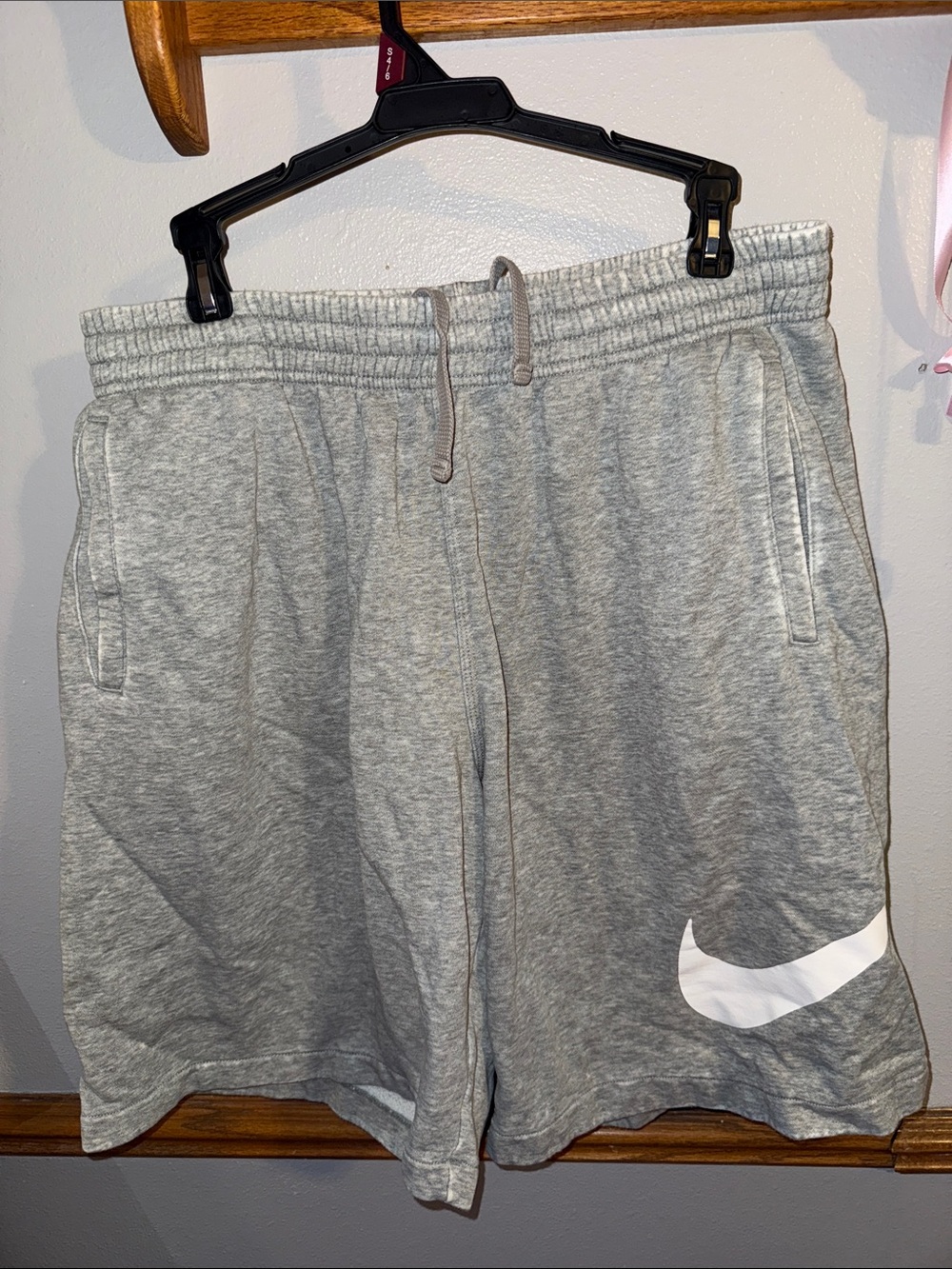 Nike Gray Athletic Shorts with White Swoosh